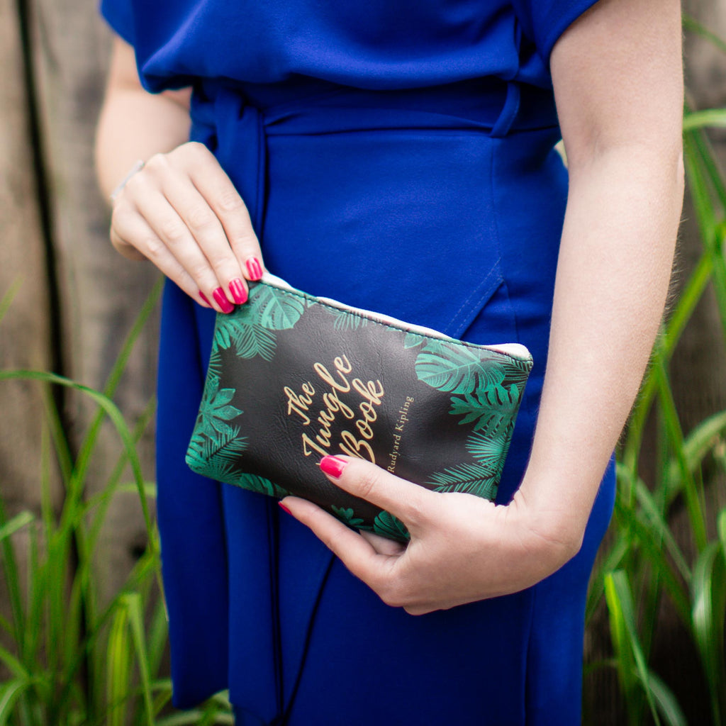 The Jungle Book Black Pouch Purse by Rudyard Kipling featuring Jungle Leaves design, by Well Read Co. - Model Standing