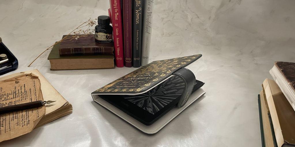 A Pride an Prejudice Kindle Cover partially opened, revealing kindle device, in a vintage style setting