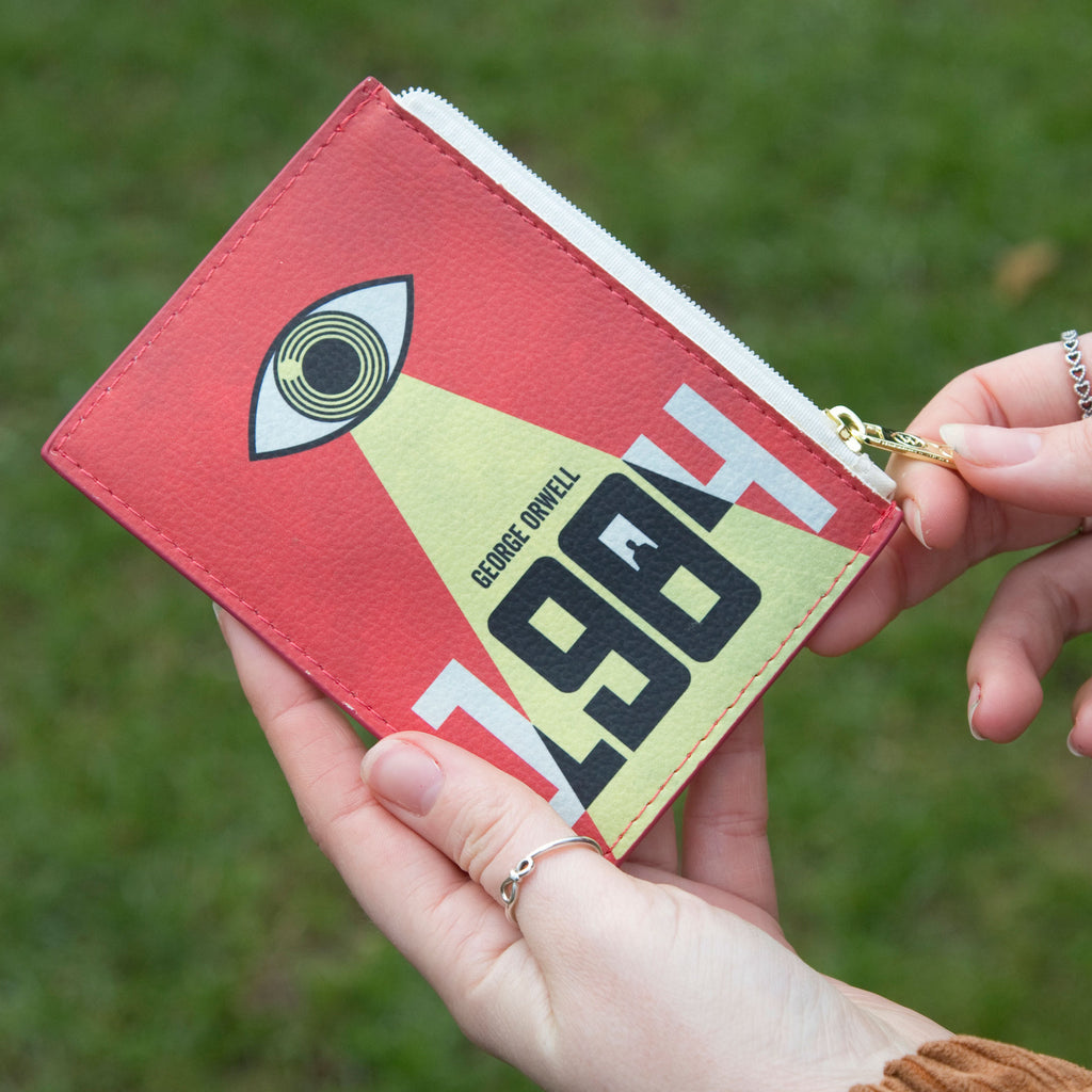 1984 Red and Yellow Coin Purse by George Orwell featuring Watchful Eye design, by Well Read Co. - Hands