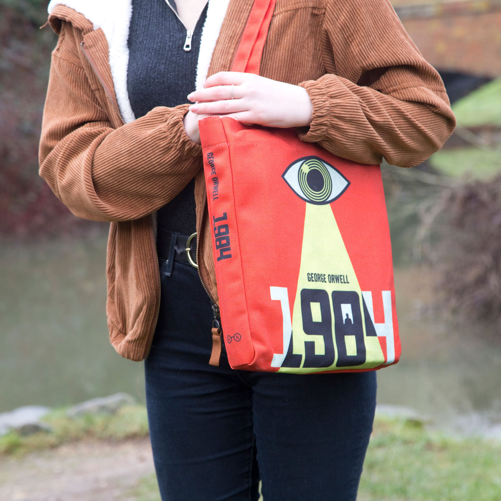 1984 Red and Yellow Tote Bag by George Orwell featuring Watchful Eye design, by Well Read Co. - Model