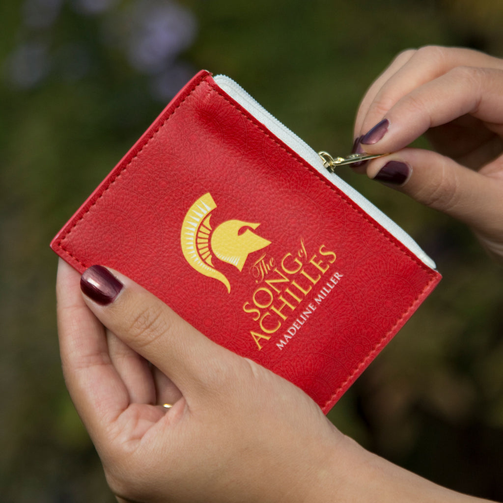 The Song of Achilles Red Coin Purse by Madeline Miller featuring Gold Trojan Helmet design, by Well Read Co. - Hand