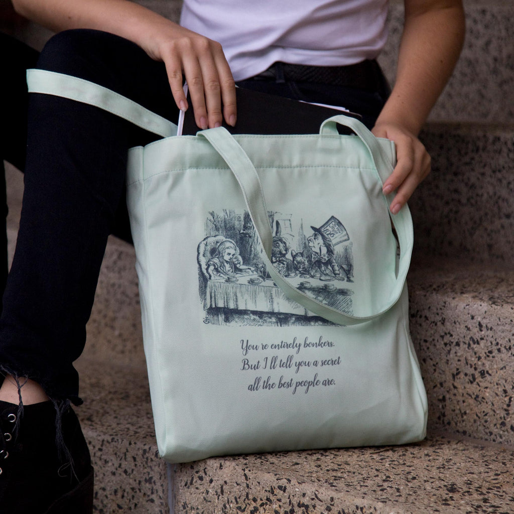 Alice's Adventures in Wonderland Green Tote Bag by Lewis Carroll featuring Alice and Cheshire Cat design, by Well Read Co. - Opening Bag