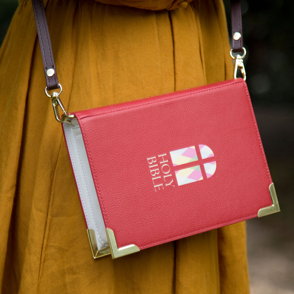 The Holy Bible Red Handbag by Well Read Co. featuring Stained-Glass Window design - Model with bag