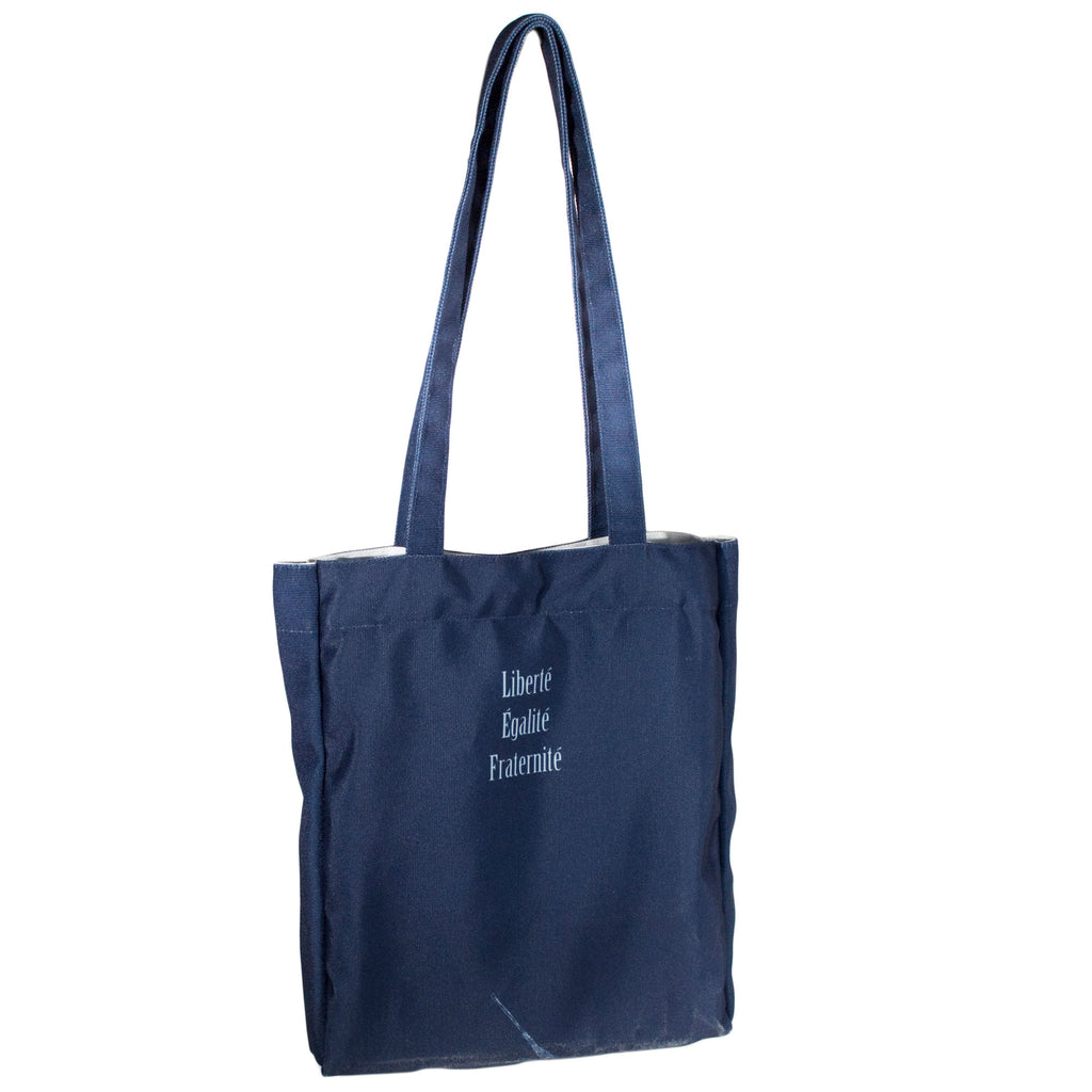 Les Misérables Navy Tote Bag by Victor Hugo featuring Cosette over French flag design, by Well Read Co. - Back