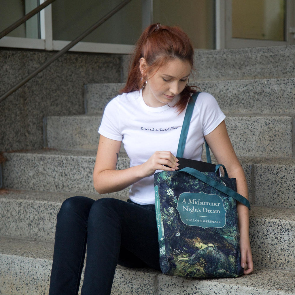 A Midsummer Night's Dream Polyester Tote Bag by William Shakespeare featuring Sleeping Tatiana design, by Well Read Co. - Model Sitting with Bag
