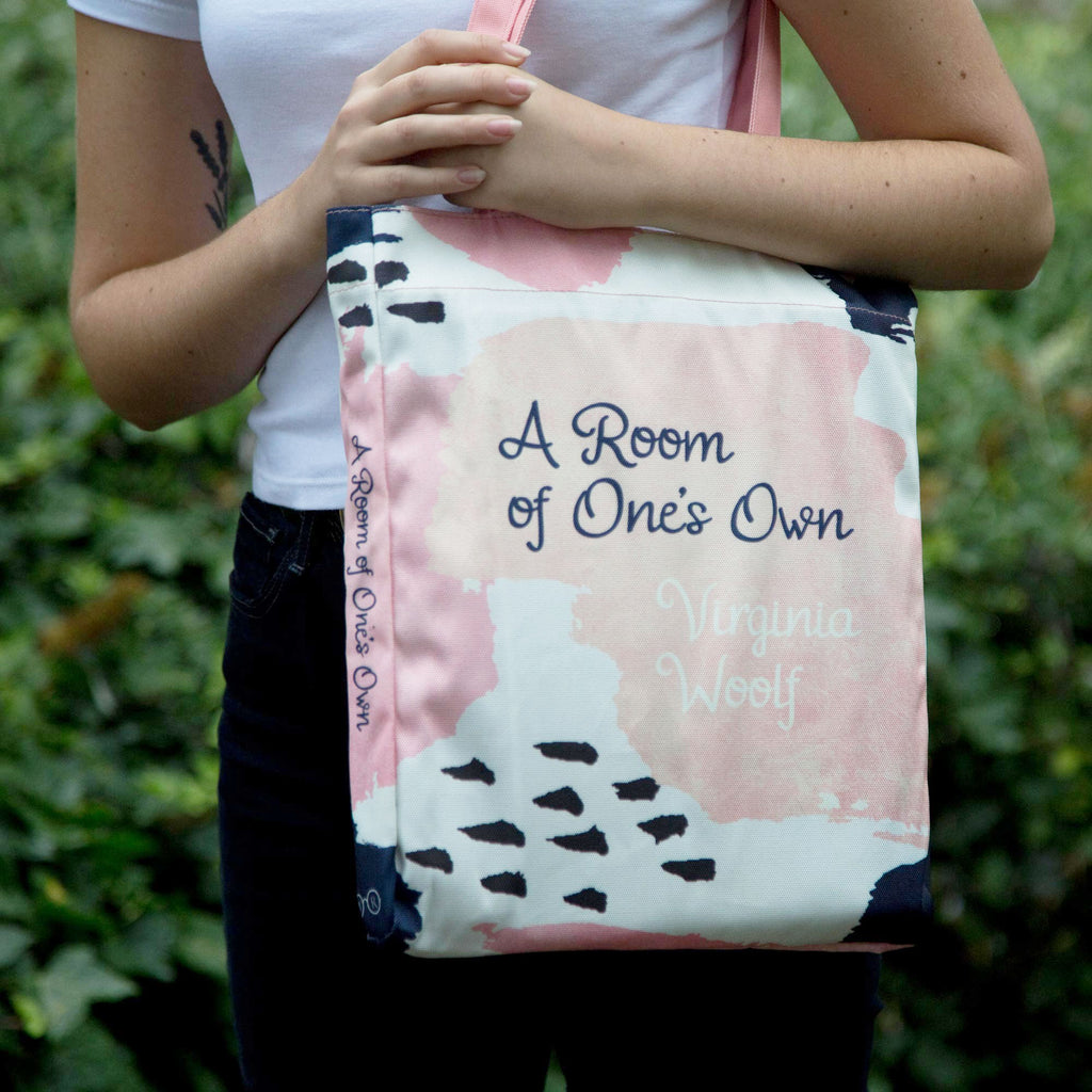 A Room of One's Own Pink and Blue Tote Bag by Virginia Woolf featuring Paint Splotches design, by Well Read Co. - Model Standing