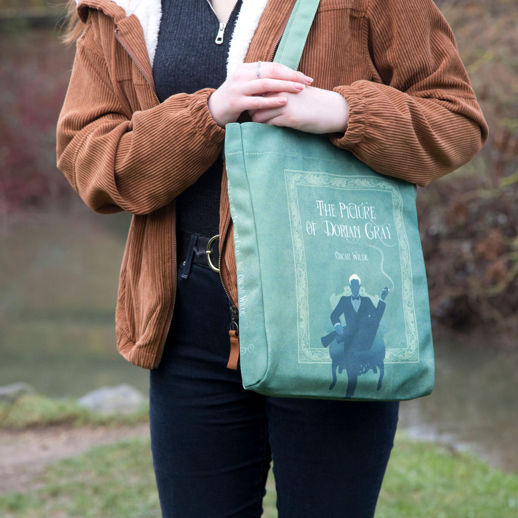 The Picture of Dorian Gray Blue Tote Bag by Oscar Wilde featuring Gentleman and Cigar design, by Well Read Co. - Model