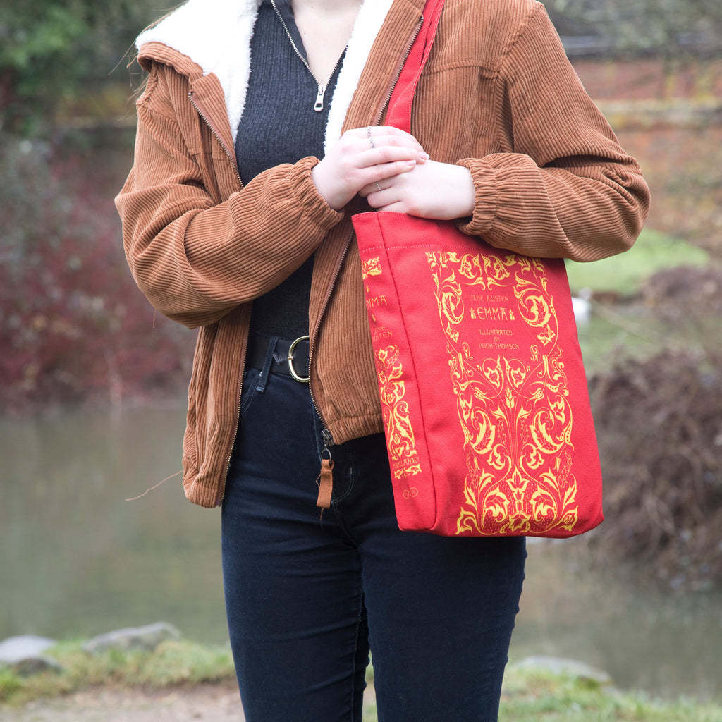 Emma Red Tote Bag by Jane Austen featuring Gold Leaf design, by Well Read Co. - model