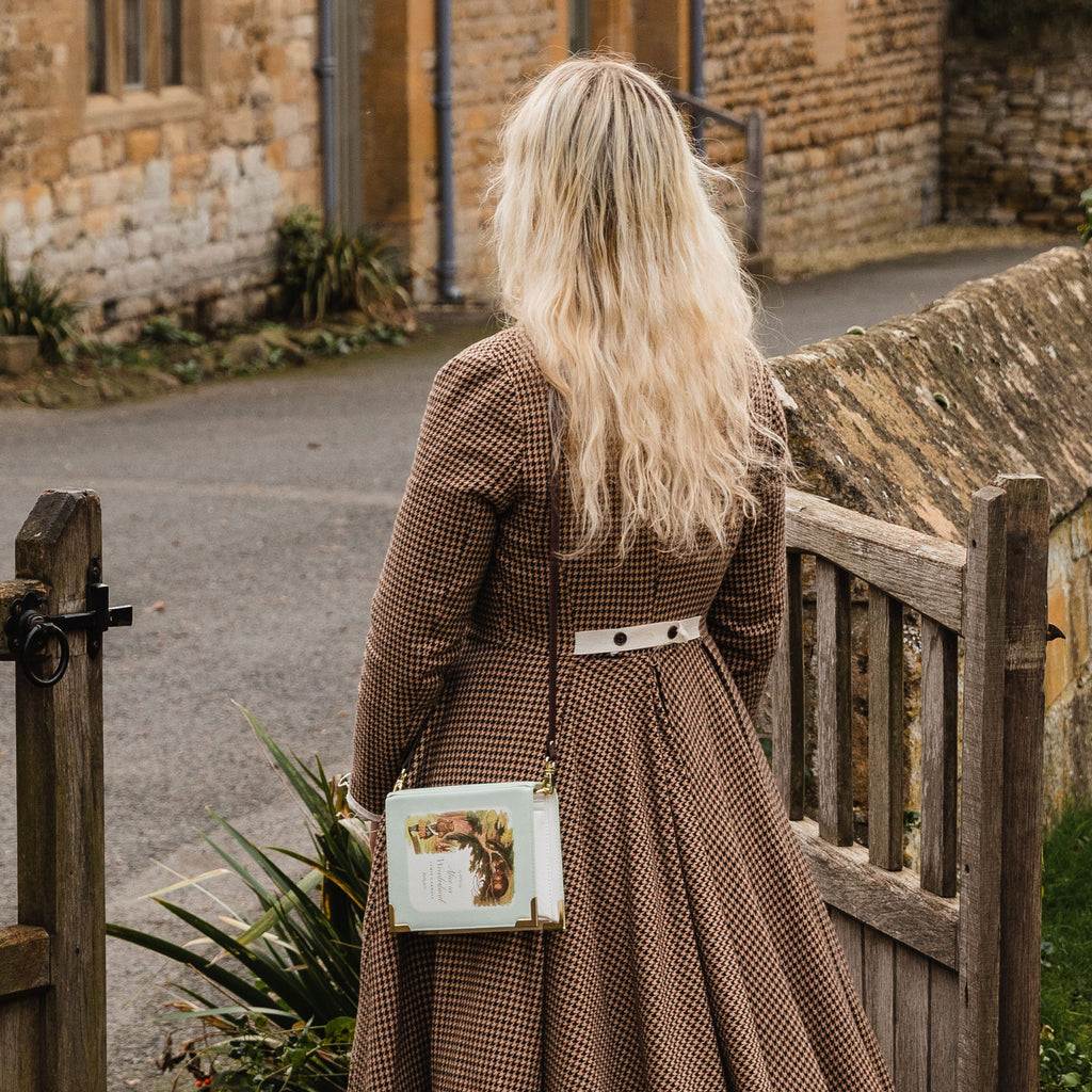 Alice's Adventures in Wonderland Green Handbag by Lewis Carroll featuring Alice and Cheshire Cat design, by Well Read Co. - Model Back
