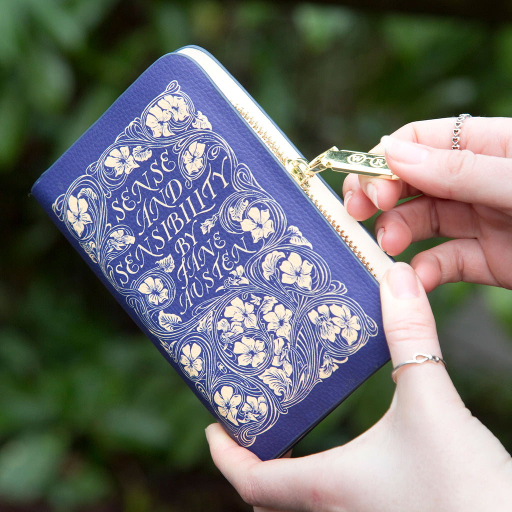 Sense and Sensibility Blue Wallet Purse by Jane Austen with Gold Flower design, by Well Read Co. - Hands